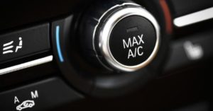 closeup-max-ac-button-car-dashboard_573x300