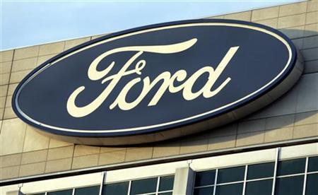 The Ford Motor Co's logo is seen on top of the Ford Motor Company World Headquarters in Dearborn, Michigan, October 26, 2009. REUTERS/Rebecca Cook