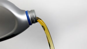 pouring motor oil