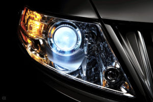 2009 Lincoln MKS: Adaptive Headlamps with Standard High-Intensity Discharge (HID) Lamps enhance nighttime visibility by illuminating more of the road and reducing glare from oncoming traffic. Sensors monitor vehicle speed and steering wheel input engaging electric motors that pivot the left headlamp up to five degrees and the right headlamp up to 15 degrees to increase the driverÕs field of vision.